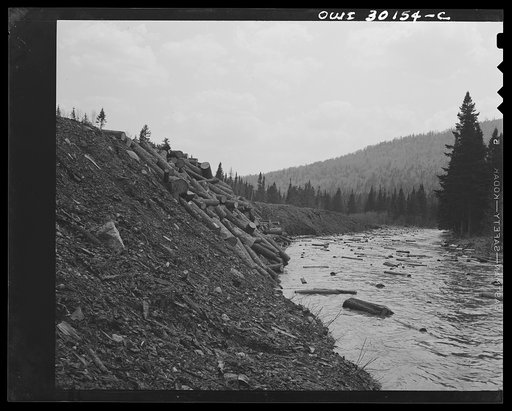 Untitled photo, possibly related to: Spring pulpwood drive on the Brown Company timber holdings in Maine. Wood not accessible to streams is hauled on sleds by horses during the winter to depots on the banks of larger streams and rivers to be pushed in during the spring drive