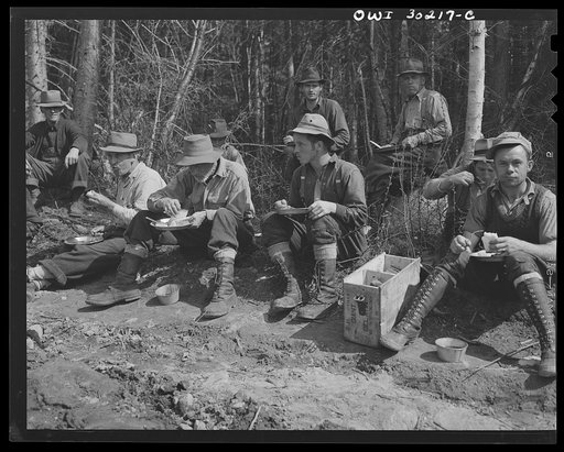 Spring pulpwood drive on the Brown company timber holdings in Maine. Mid-morning or mid-afternoon lunch by the side of the road near where woodsmen are working