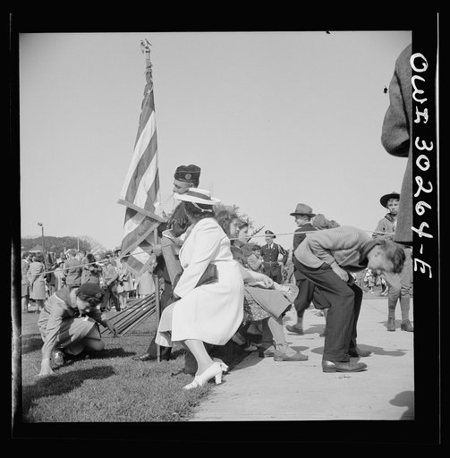 Untitled photo, possibly related to: Gloucester, Massachusetts. Memorial Day, 1943. An aged member of the American Legion band resting after the parade