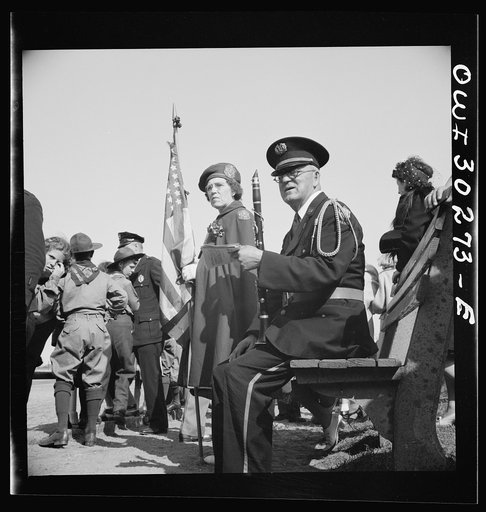 Gloucester, Massachusetts. Memorial Day, 1943. An aged member of the American Legion band resting after the parade