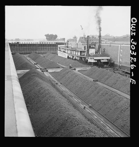 Untitled photo, possibly related to: Gallipolis, Ohio. Water gates closing behind coal barges
