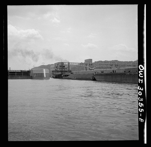 Gallipolis, Ohio. Towboat coming out of locks