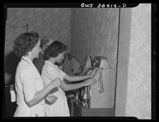 Point Pleasant, West Virginia. Nancy and Mrs. Fergusen playing the slot machines at Moose Temple