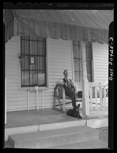 Residents of Gallipolis sitting on front porch