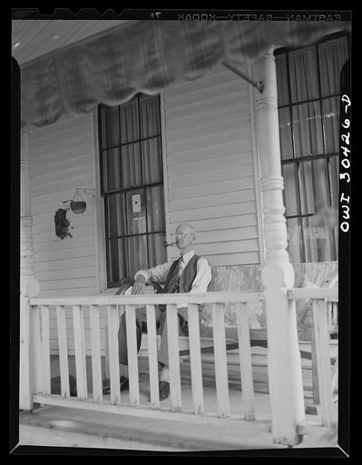 Resident of Gallipolis sitting on front porch