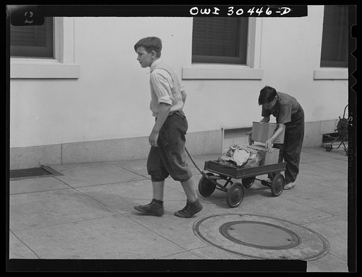 Untitled photo, possibly related to: Washington, D.C. "I'll Carry Mine," a campaign to conserve transportation facilities and thus save rubber and gasoline. Boys delivering packages