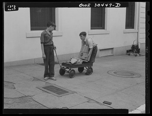 Untitled photo, possibly related to: Washington, D.C. "I'll Carry Mine," a campaign to conserve transportation facilities and thus save rubber and gasoline. Boys delivering packages