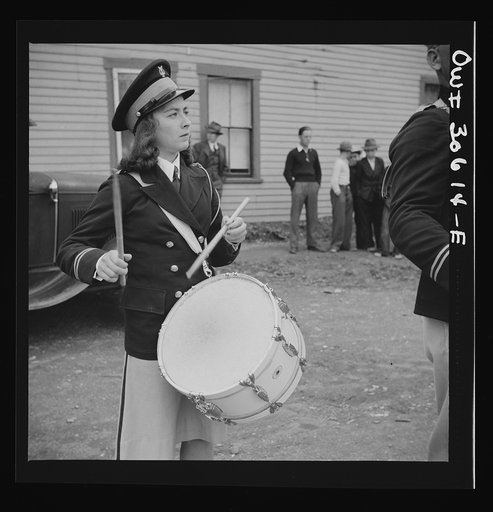 Ashland, Aroostook County, Maine. Though only a small farming center with a population under 1000, Ashland has a good band with lots of purple trim and gold braid for the Memorial Day ceremony