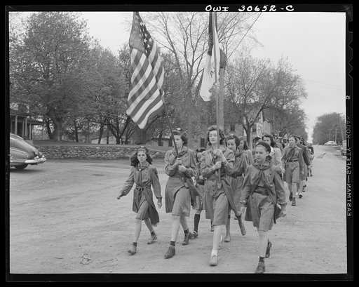 Ashland, Aroostook County, Maine. Girl scouts marching through the streets during the Memorial Day ceremonies