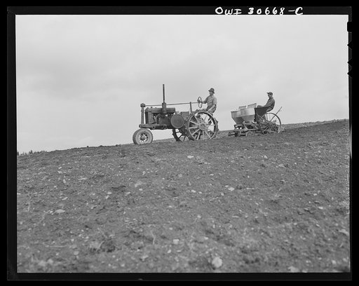 Fort Kent, Aroostook County, Maine. Spring potato planting on the French Acadian farm of Leonard Gagnon