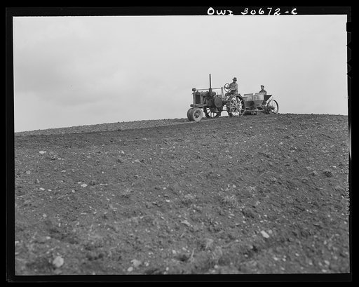 Untitled photo, possibly related to: Fort Kent, Aroostook County, Maine. Spring potato planting on the French Acadian farm of Leonard Gagnon