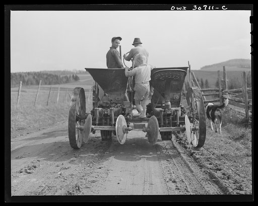 Untitled photo, possibly related to: Fort Kent, Aroostook County, Maine. Spring potato planting on the French Acadian farm of Leonard Gagnon
