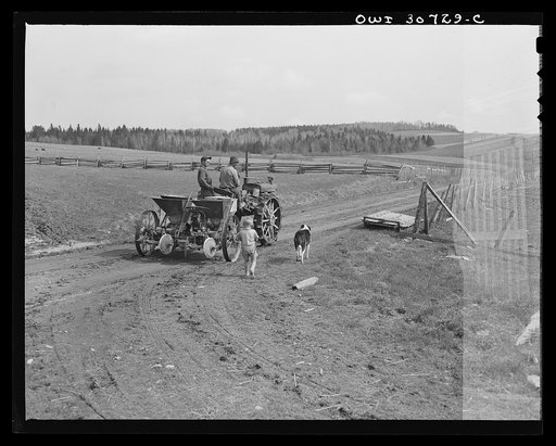 Fort Kent, Aroostook County, Maine. Spring potato planting on the French Acadian farm of Leonard Gagnon. Starting out for the potato field