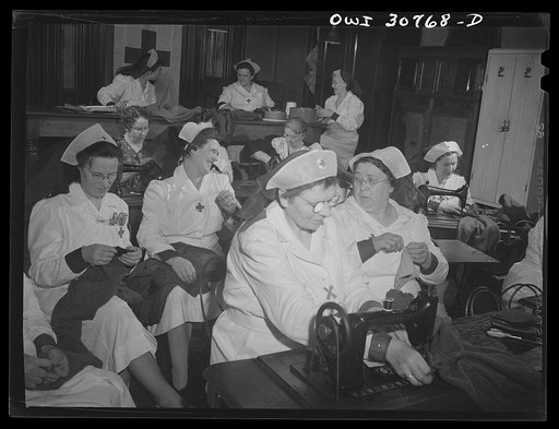 Lithuanian chapter of the Red Cross at work finishing sweaters. Pittsburgh, Pennsylvania
