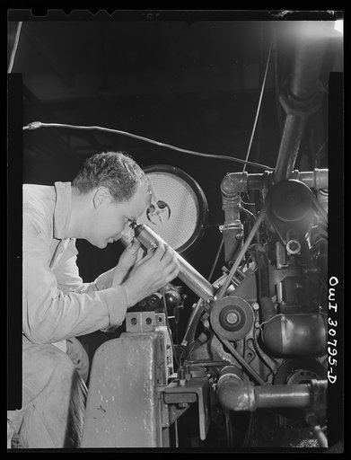 Washington, D.C. Testing substitute gasoline and measuring the degree of wear which it produces on an automobile engine cylinder at the U.S. Bureau of Standards