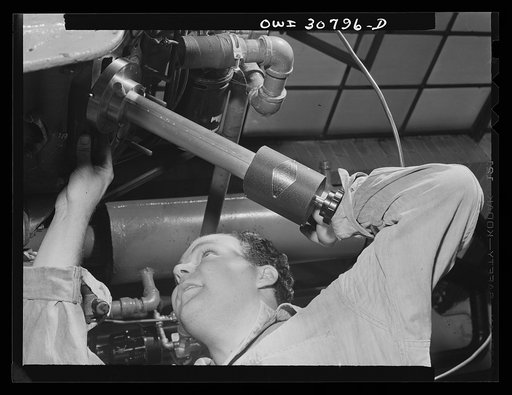 Washington, D.C. Testing substitute gasoline and measuring the degree of wear which it produces on an automobile engine cylinder at the U.S. Bureau of Standards