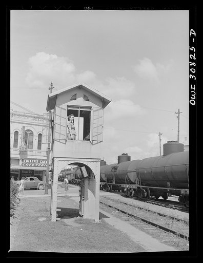 Untitled photo, possibly related to: Beaumont, Texas. Lady who operates block signals for a railroad crossing