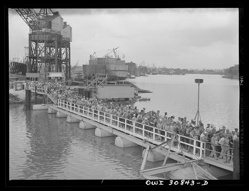 Beaumont, Texas. Five p.m. change of shift at the Pennsylvania shipyards