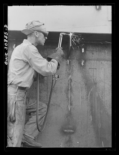 Beaumont, Texas. Welder on the hull of a ship at the Pennsylvania shipyards
