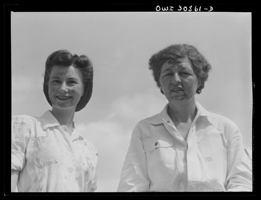 Untitled photo, possibly related to: Beaumont, Texas. Miss Manie Fairchild and Mrs. Dorothy Mason, mechanics at the city transit company. They work on buses