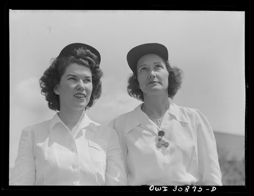 Untitled photo, possibly related to: Beaumont, Texas. Miss Manie Fairchild and Mrs. Dorothy Mason, mechanics at the city transit company. They work on buses