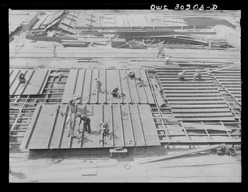 Untitled photo, possibly related to: Beaumont, Texas. Working ways at the Pennsylvania shipyards. Here the sides of the hulls for cargo vessels are put together