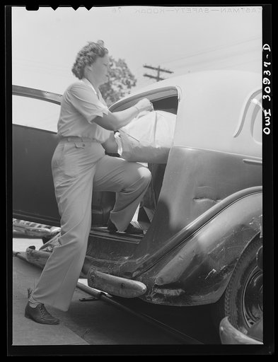 Untitled photo, possibly related to: Beaumont, Texas. Laundry truck driver