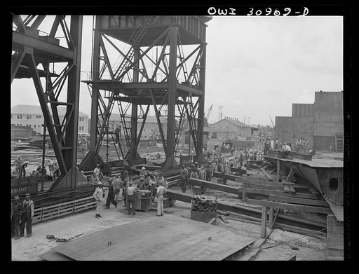 Untitled photo, possibly related to: Beaumont, Texas. Workers leaving the Pennsylvania shipyards at the change of shift