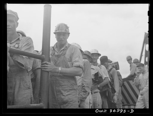 Untitled photo, possibly related to: Beaumont, Texas. Shipyard workers leaving the Pennsylvania shipyards at the change of shift