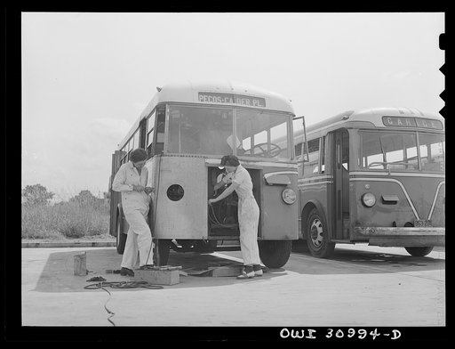 Beaumont, Texas. Mammie Fairchild and Dorothy Mason working on a bus at the city transit company