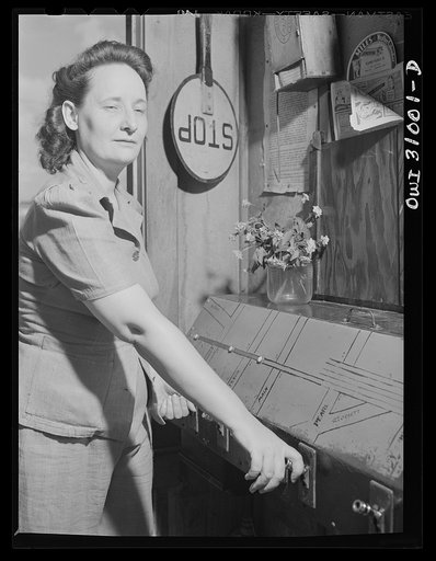Untitled photo, possibly related to: Beaumont, Texas. Lady who operates block signals for railroad crossing