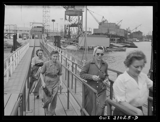 Untitled photo, possibly related to: Beaumont, Texas. Women workers leaving the Pennsylvania shipyards