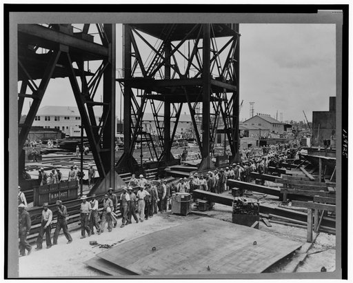 Beaumont, Texas. Workers leaving the Pennsylvania shipyards at the change of shift