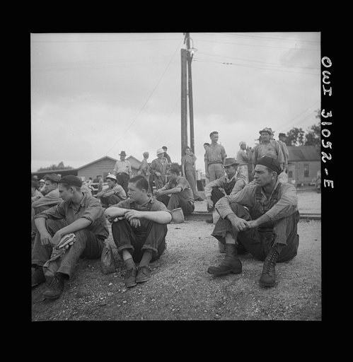 Untitled photo, possibly related to: Beaumont, Texas. Shipyard workers waiting to go into work at the Pennsylvania shipyards