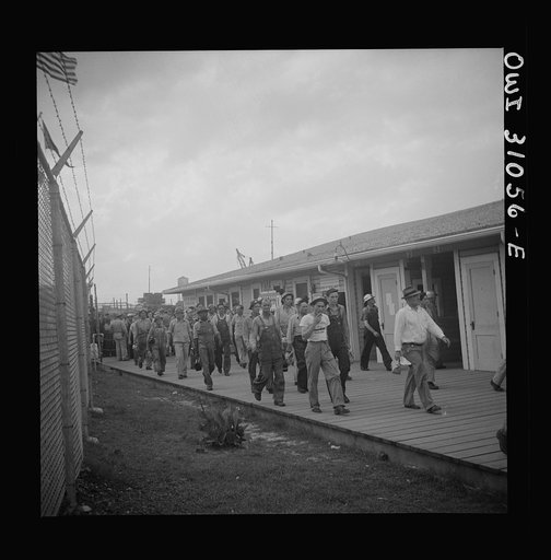 Untitled photo, possibly related to: Beaumont, Texas. Workers leaving the Pennsylvania shipyards at the change of shift