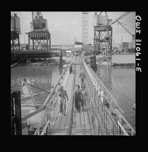 Untitled photo, possibly related to: Beaumont, Texas. Women workers leaving the Pennsylvania shipyards