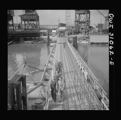 Untitled photo, possibly related to: Beaumont, Texas. Women workers leaving the Pennsylvania shipyards