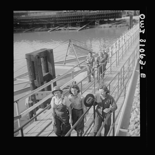 Untitled photo, possibly related to: Beaumont, Texas. Women workers leaving the Pennsylvania shipyards