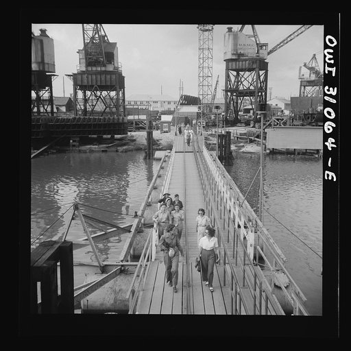 Untitled photo, possibly related to: Beaumont, Texas. Women workers leaving the Pennsylvania shipyards