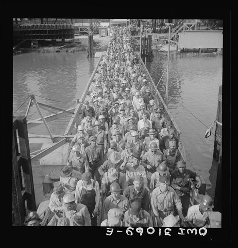 Beaumont, Texas. Workers leaving the Pennsylvania shipyards