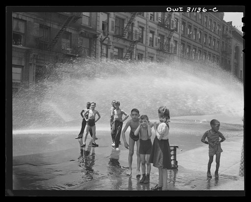 New York, New York. Children street bathing on the East Side