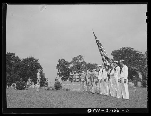 Merchant marine seaman given military funeral. A military guard fires a salute as a tribute to Herman Sweitzer, merchant marine member who was killed in the recent ammunition ship-tanker collision off Norfolk. Sweitzer was buried at Mount Olivet Cemetery, Baltimore, with full military honors