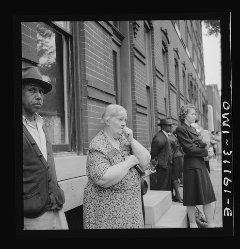 Baltimore, Maryland. Funeral of a merchant seaman. Mourning neighbors and friends