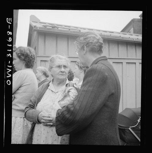 Baltimore, Maryland. Funeral of a merchant seaman. Mourning neighbors and friends