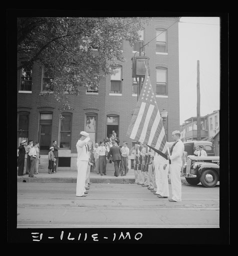 Baltimore, Maryland. Funeral of a merchant seaman. Pallbearers with flag-covered casket