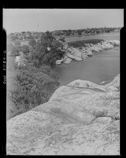 Gloucester, Massachusetts. The New England coast, lined with great masses of rocks