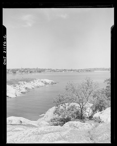 Gloucester, Massachusetts. The New England coast, lined with great masses of rocks