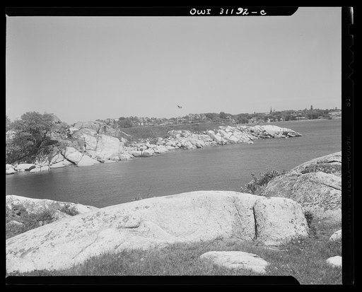 Gloucester, Massachusetts. New England coast, lined with great masses of rocks
