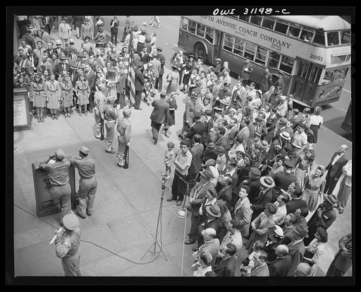 New York, New York. Flag raising ceremony at the Four Freedoms war bond show on the plaza of the International building at Rockefeller center