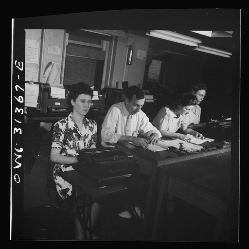Untitled photo, possibly related to: Washington, D.C. Preparing an advisory forecast at the U.S. Weather Bureau. Transmission of weather data by teletype to military and civilian war centers